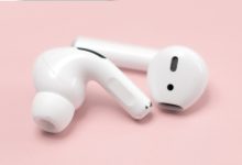 white wireless earbuds